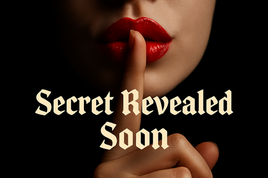 Focus: Hush finger over ruby red lips, Black Background, words "Secret Revealed Soon" in Pirata One font